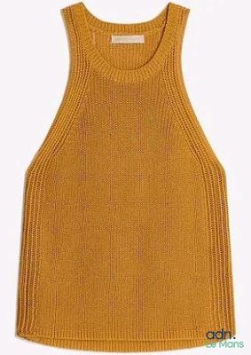 a close up of a yellow knitted tank top on a white background