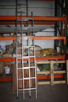 a ladder that is leaning against a wall in a room
