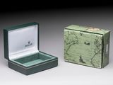 an image of a green box with a ring inside of it