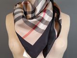 a woman ' s scarf on a mannequin mannequin mannequin mannequin mannequin mannequin mannequin mannequin mann