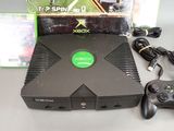 a box with a video game controller and a box with a video game on it