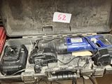 une image représentant une boîte à outils contenant tout un tas d'outils