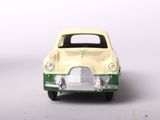 a toy car that is sitting on a white surface