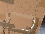 a cardboard box that is sitting on the ground