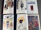 four pages of comic books with a drawing of a man and a woman