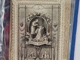 a close up of a card with a picture of a woman on a table