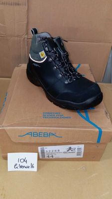 a box with a pair of black shoes on it