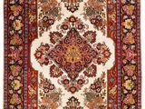 an antique persian rug with a floral design on a white background