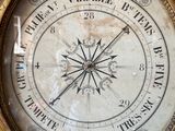 a clock that is on the wall in the room