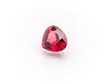 a heart shaped pink tourmaline gems on a white background