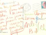 a postcard with a handwritten message on it