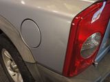 a close up of the tail light of a pickup truck