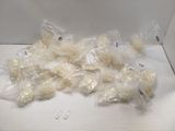 a pile of white rice sitting on top of a white table