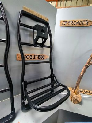 two ladders that are on the wall next to each other