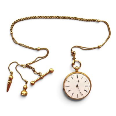 gold plated pocket watch with chain and earrings on a white background