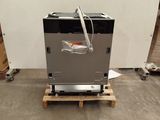 a machine that is sitting on a pallet in a room