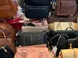 a lot of bags that are on a table
