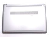 a laptop that is sitting on a white surface