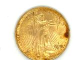 une image d'une pièce d'or sur une surface blanche