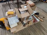 a cart full of boxes and other items on the floor