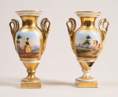 pair of antique gold vases with hand painted scenes on them