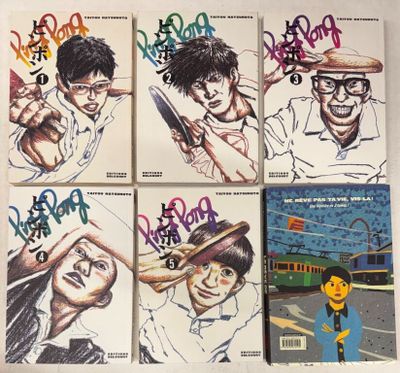 six albums de BD sont alignés sur une surface blanche