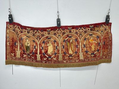an image of a tapestry hanging on a wall