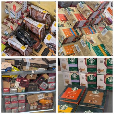 many different types of coffees on display in a store