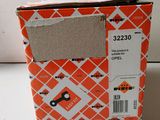 a box with a pair of scissors inside of it
