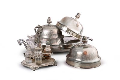 a silver plate with a silver teapot and a silver plate with a silver teapot and a silver plate with a silver teapot on it