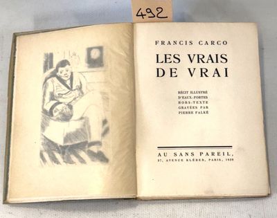 a book with a drawing of a woman sitting in a chair