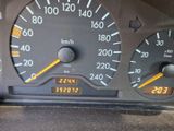 a close up of a speedometer in a car