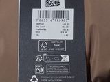 a label on the back of a jacket with a qr code on it