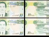 quatre billets de banque de différentes devises sont représentés sur un fond noir