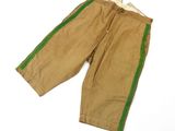 a close up of a pair of brown pants with green trims