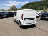 a white van that is parked in a parking lot
