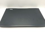 an open laptop computer sitting on top of a white surface