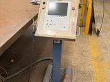 a machine that is sitting on a table in a factory