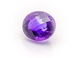 a purple amethe gems on a white background