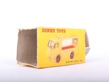 a small box with a toy truck inside of it