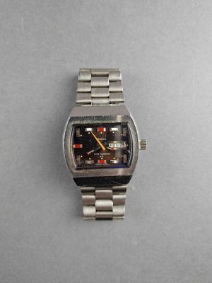 an image of a wrist watch with a black face and a yellow second hand