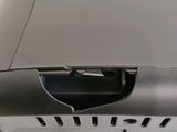a close up of a laptop with a hole in it