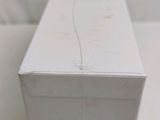 a white box that has a toothbrush inside of it