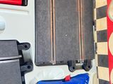 a box with a bunch of luggage and a pair of scissors