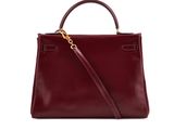 a burgundy leather handbag with a gold chain on the handle