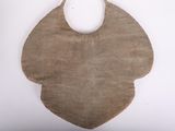 a brown piece of cloth with a face on it