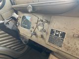 a close up of the dashboard of an old car