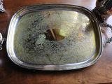 a silver tray with a piece of butter on it