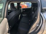 a car that has two seats in the back of it