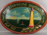 un panneau sur lequel figure un phare et où l'on peut lire « le phare de Baystone »